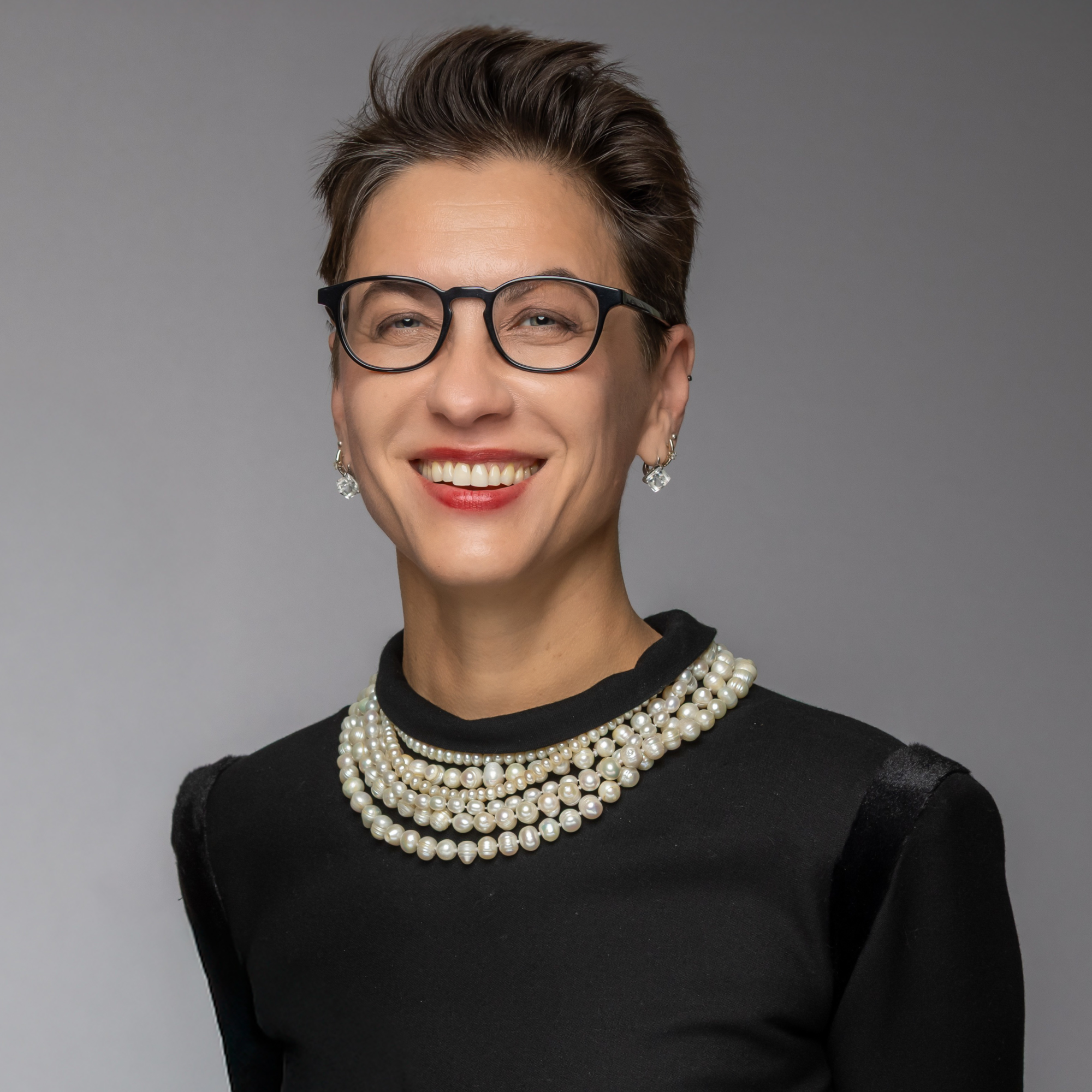 Natalie Reznikov, smiling.